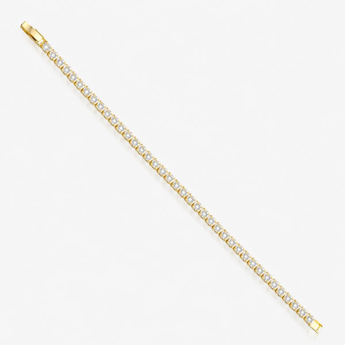 Best Stacking Bracelets Under $10: Read the Length Before You Buy 7 Gold tennis bracelet with a continuous row of square set clear stones and a rectangular click down clasp at one end