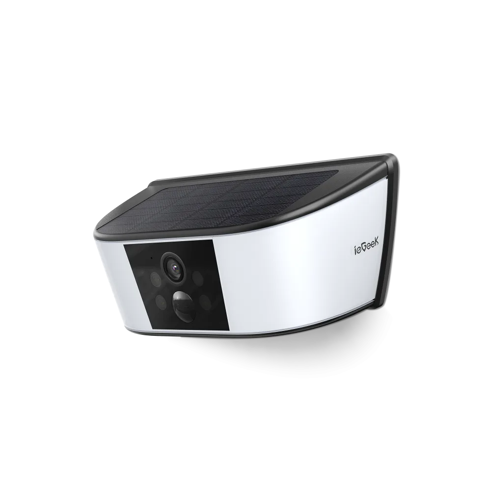 Wedge shaped white wall light with a solar panel across the top and a camera lens with motion sensor on the front face