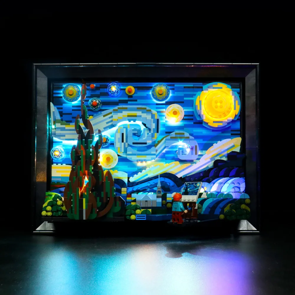 The LEGO Vincent van Gogh Starry Night model lit from behind, the brick built moon and stars glowing yellow and white against the blue sky