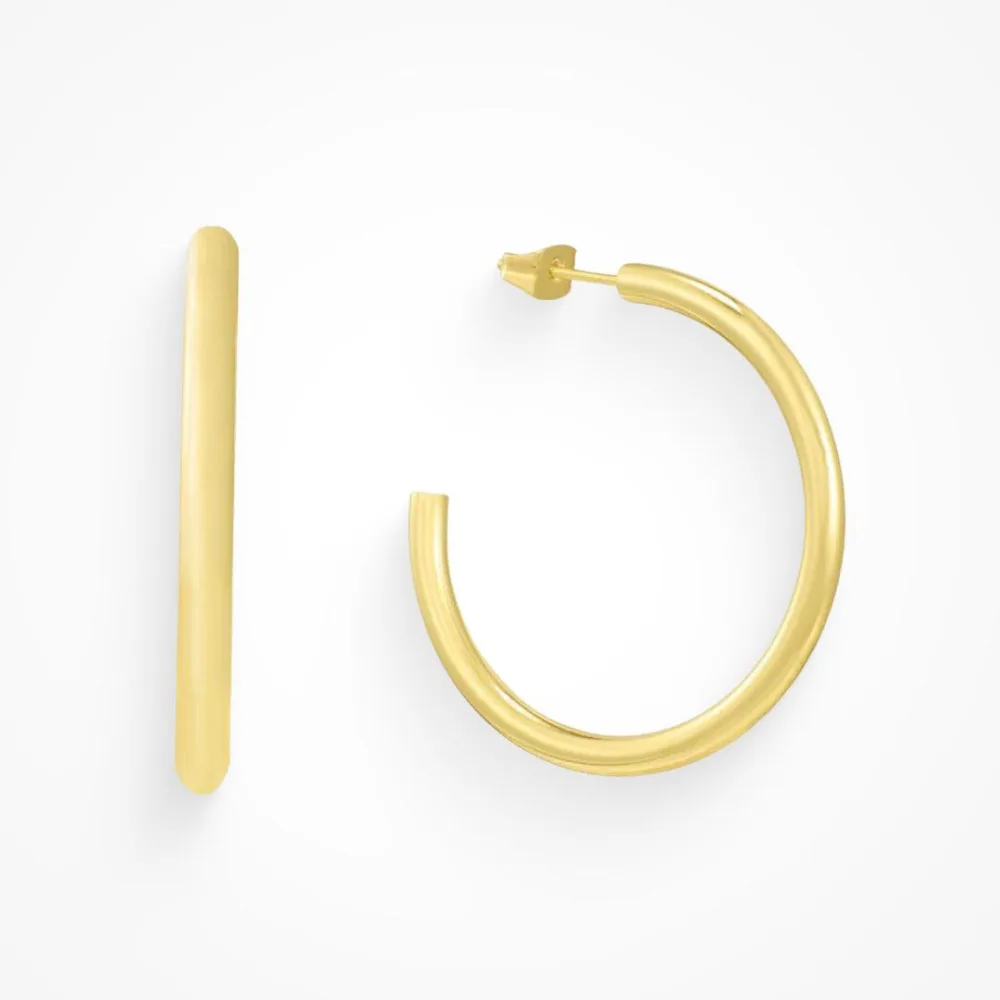 Best Waterproof Gold Jewelry Under $20: What Tarnish-Free Really Means 3 A thick gold open hoop earring shown from the front and the side, with a straight post and a chunky rounded profile
