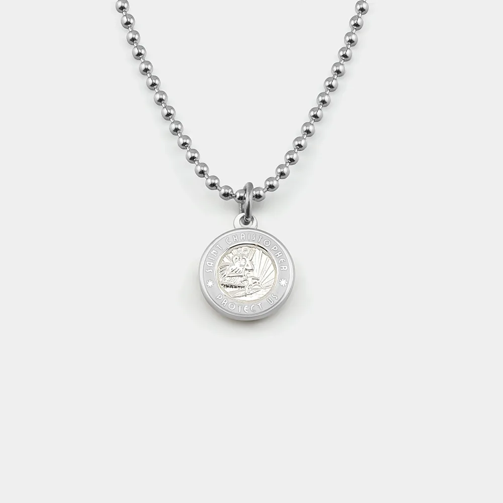 Best St. Christopher Surf Necklaces: A Guide to Get Back's Surfer Medallions 3 A small silver St. Christopher medallion with white enamel on a silver ball chain