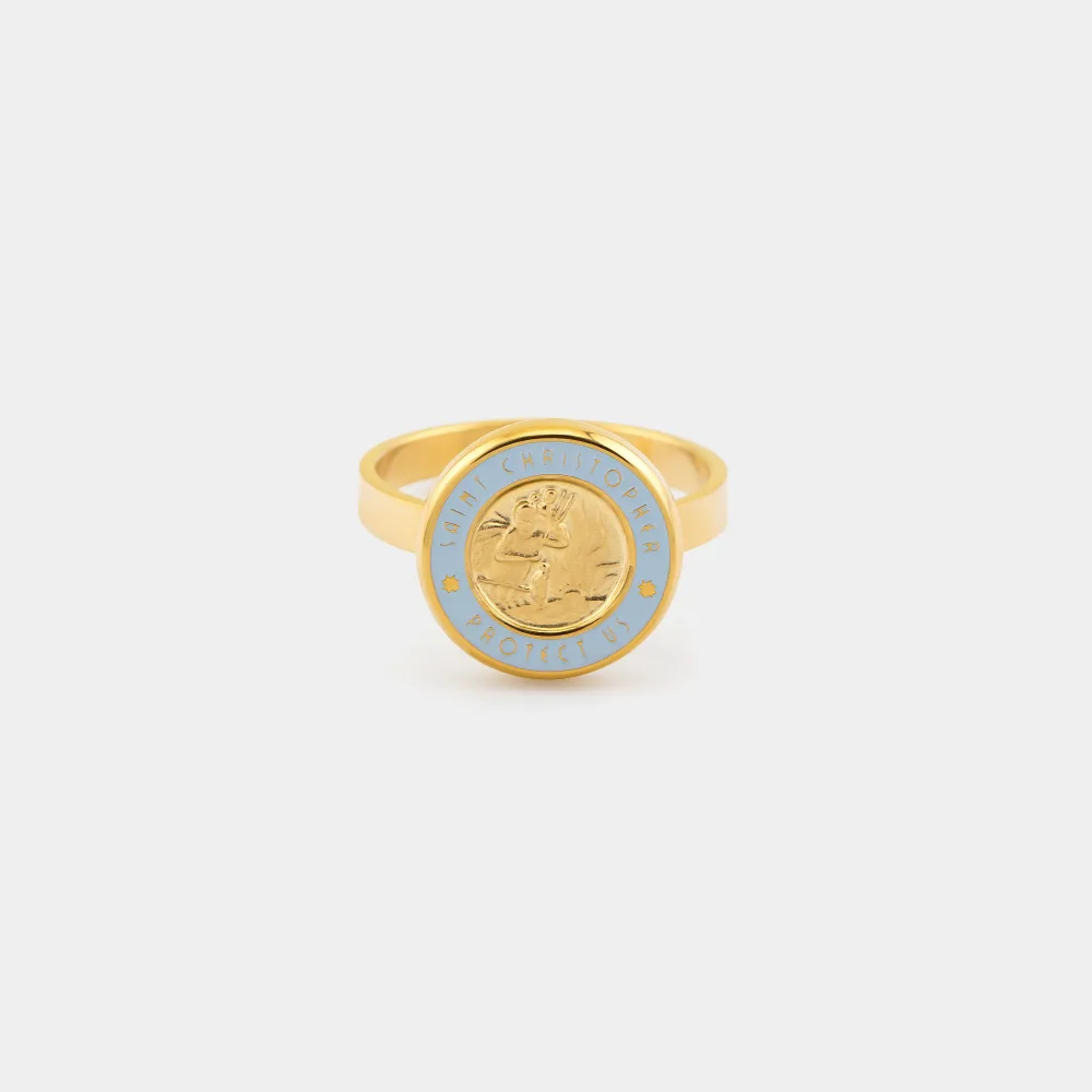 Best St. Christopher Surf Necklaces: A Guide to Get Back's Surfer Medallions 6 A gold St. Christopher ring with a baby blue enamel border around a raised gold medallion face, reading Saint Christopher Protect Us