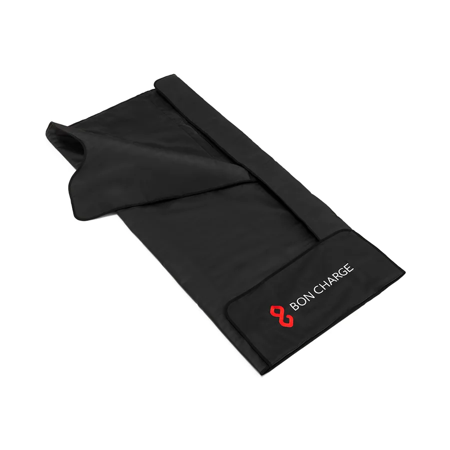 BON CHARGE Infrared Sauna Blanket folded flat, black exterior with brand logo on the foot panel