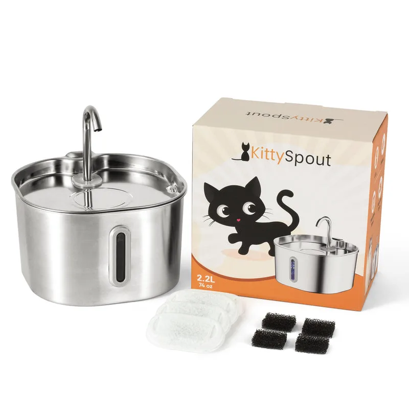 The KittySpout 2.2L stainless steel fountain shown beside its retail box, two white replacement filter pads and four black foam filter blocks on a white background