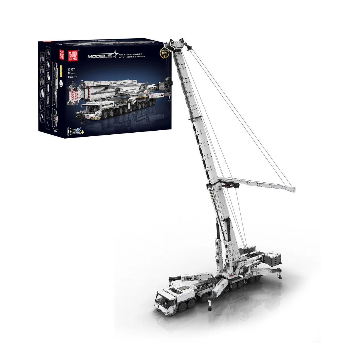 Best RC and Motorized Construction Building Sets for Adults (2026 Guide) 1 The Mould King 17007 mobile crane built in white bricks with its lattice boom fully extended and guy cables running to the mast, shown beside its retail box