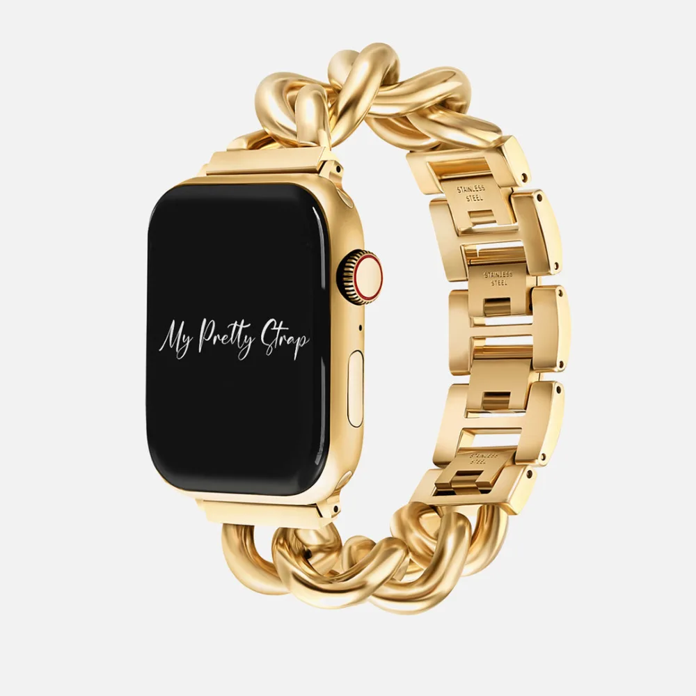 Best Apple Watch Bands That Look Like Jewelry 1 A gold Apple Watch on a chunky curb chain bracelet strap, the flat links stamped with the words stainless steel, photographed against a plain pale background