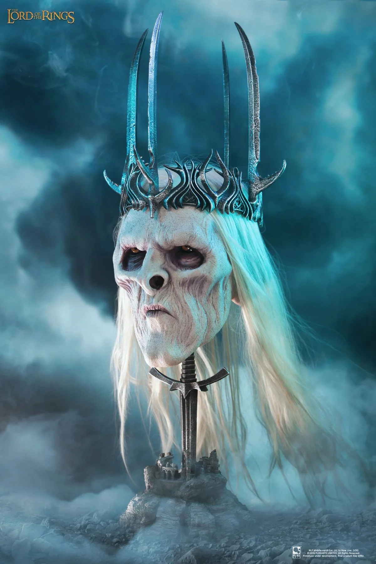 The Nazgul King art mask seen from a slight angle, showing the wrinkled silicone skin, hollow cheeks and the four blades rising from the crown