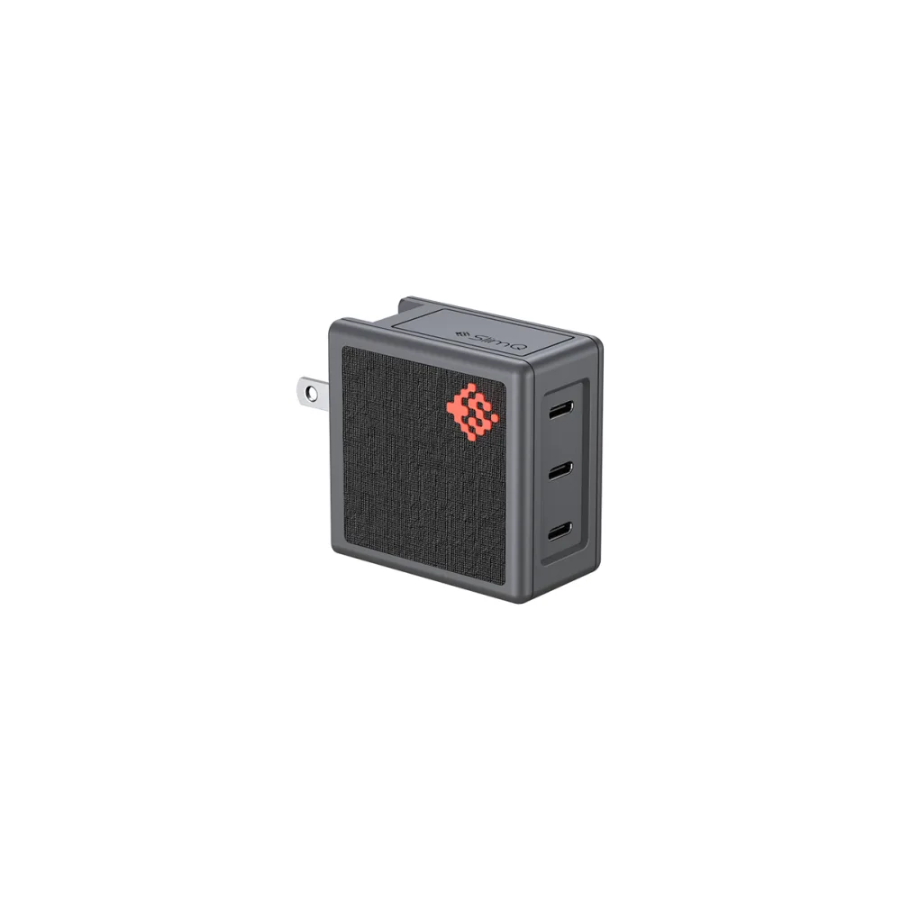 The SlimQ 65W GaN charger, a compact grey unit with three USB-C ports